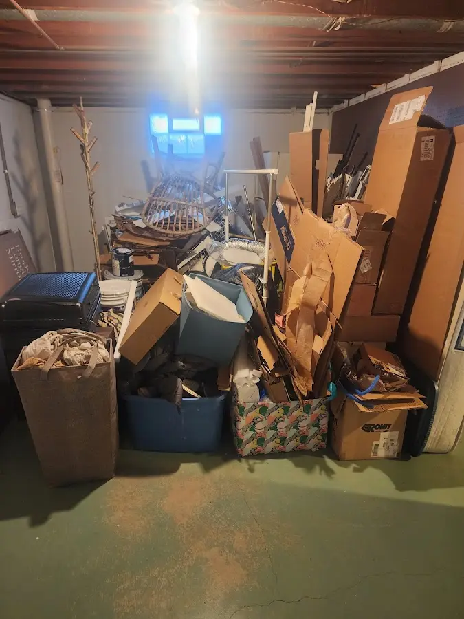 Roll-off dumpster container at job site for Concrete Dumpster Rental in Two Rivers